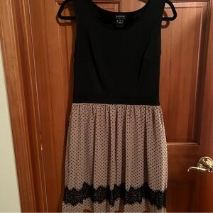 En Focus Black and Beige A Line dress with polka dot skirt with lace appliqué